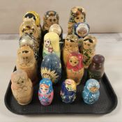 Eighteen Russian babushka nesting dolls.