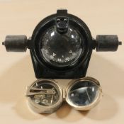 An American Ritchie B-60 compass on gimbal, and a further reproduction brass natural sine compass.