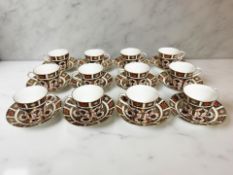 A set of twelve Royal Crown Derby Imari porcelain tea cups and matching saucers, pattern 1128,