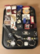 A collection of costume jewellery, lady's and gent's wristwatches, silver dress rings, a lighter.