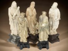 Five Chinese carved soapstone figures, tallest 24.5 cm.