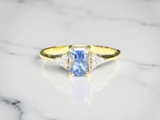 A 14ct yellow gold Ceylon sapphire and diamond ring, size N.