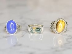 Three Sterling silver rings set with simulated stones.