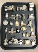 A collection of miniature quartz timepieces.