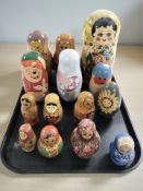 Fifteen Russian babushka nesting dolls.