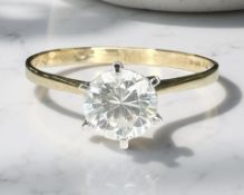 A 9ct yellow gold cubic zirconia solitaire ring, size Q/R. CONDITION REPORT: 1.7g.