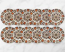 A set of twelve Royal Crown Derby Imari porcelain dessert plates, pattern 1128,