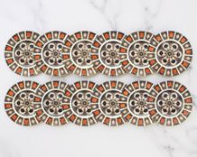 A set of twelve Royal Crown Derby Imari porcelain dinner plates, pattern 1128,