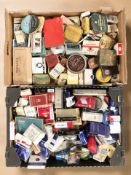 A collection of cigarette and tobacco tins, empty packets, etc.