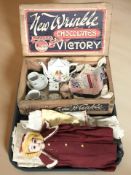 A vintage pine Victory chocolates box containing a child's porcelain tea for two,