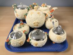 A group of Clarice Cliff for Newport Pottery Celtic Harvest preserve pots, biscuit barrel, tea pot,