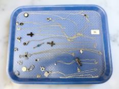 A group of costume jewellery, white metal chains, whitby jet pendants on chains,