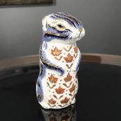 A Royal Crown Derby porcelain Chipmunk paperweight, with silver stopper.