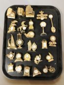 A collection of miniature quartz timepieces.