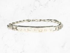 A Sterling silver identity bracelet CONDITION REPORT: 17.