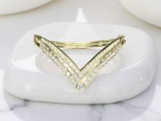 An 18ct yellow gold diamond V-shaped bangle, total diamond 2.6ct.