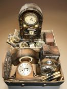 A collection of mantel and wall clocks.