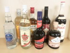 Eight various bottles of alcohol including Pimms, Havana Club, Barbados rum, mulled wine, etc.