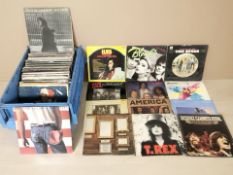 Vinyl LP records including Neil Young, Bruce Springsteen, T-Rex, America, Dire Straits, Billy Idol,