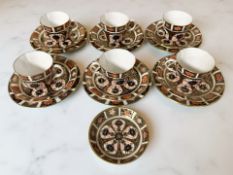 Six Royal Crown Derby Imari porcelain tea cup, saucer and side plate trios, pattern 1128,