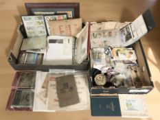 A collection of cigarette cards, ephemera, postcards, road atlases, etc.