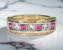 A 9ct yellow gold synthetic ruby ring, size M. CONDITION REPORT: 2.2g.