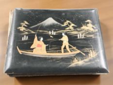 A Japanese export lacquer photograph album with watercolour painted interior, 37 cm x 29 cm.