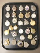A collection of reproduction pocket watches.