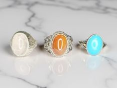 Three Sterling silver rings set with simulated stones.