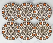 A set of six Royal Crown Derby Old Imari porcelain soup bowls, pattern 1128,