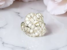 A heavy silver encrusted ring, size S CONDITION REPORT: 21.