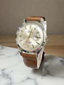 A gent's stainless steel Oris centre seconds calendar wristwatch, case 35 mm.