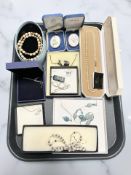 A collection of boxed costume jewellery including lotus pearls, a Swarovski crystal pendant,
