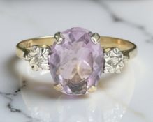 A 9ct yellow gold amethyst dress ring, size O. CONDITION REPORT: 1.6g.
