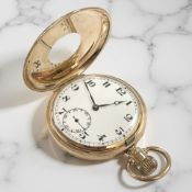 A 9ct yellow gold half hunter pocket watch, enamel dial with Arabic numerals and subsidiary seconds,