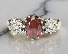 A 9ct yellow gold garnet dress ring, size N/O. CONDITION REPORT: 2.6g.