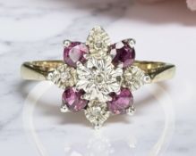 A 9ct yellow gold synthetic ruby cluster ring, size O. CONDITION REPORT: 2.9g.