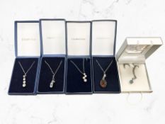 Five silver necklaces with pendants