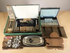 A group of boxed cutlery, spoon racks, teaspoons, etc.