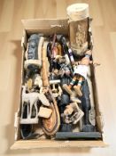 A collection of ethnic wooden carvings, figure with beadwork decoration, etc.
