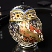 A Royal Crown Derby porcelain Little Owl paperweight, with silver stopper.