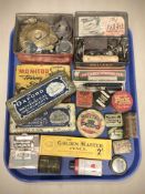 A collection of vintage tins including record player needle tins, Marksman air rifle pellets,