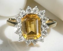 A 9ct yellow gold citrine cluster ring, size O. CONDITION REPORT: 3.1g.
