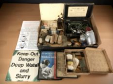 A group of vintage first aid tins and first aid equipment, signs and prints, etc.