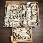 A collection of border collie ornaments and groups.