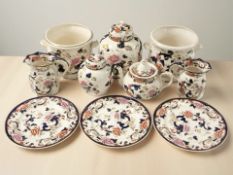 A collection of Mason's Mandalay Ironstone ceramics including a pair of planters, ginger jars, etc.