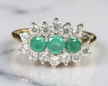 A 9ct yellow gold dress ring set with synthetic emerald, size N. CONDITION REPORT: 2.