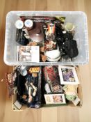 A collection of Star Wars collectibles including figurines, wristwatch, etc.