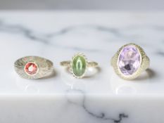 Three Sterling silver rings set with simulated stones.