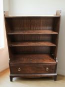 A Stag waterfall bookcase, width 77 cm.